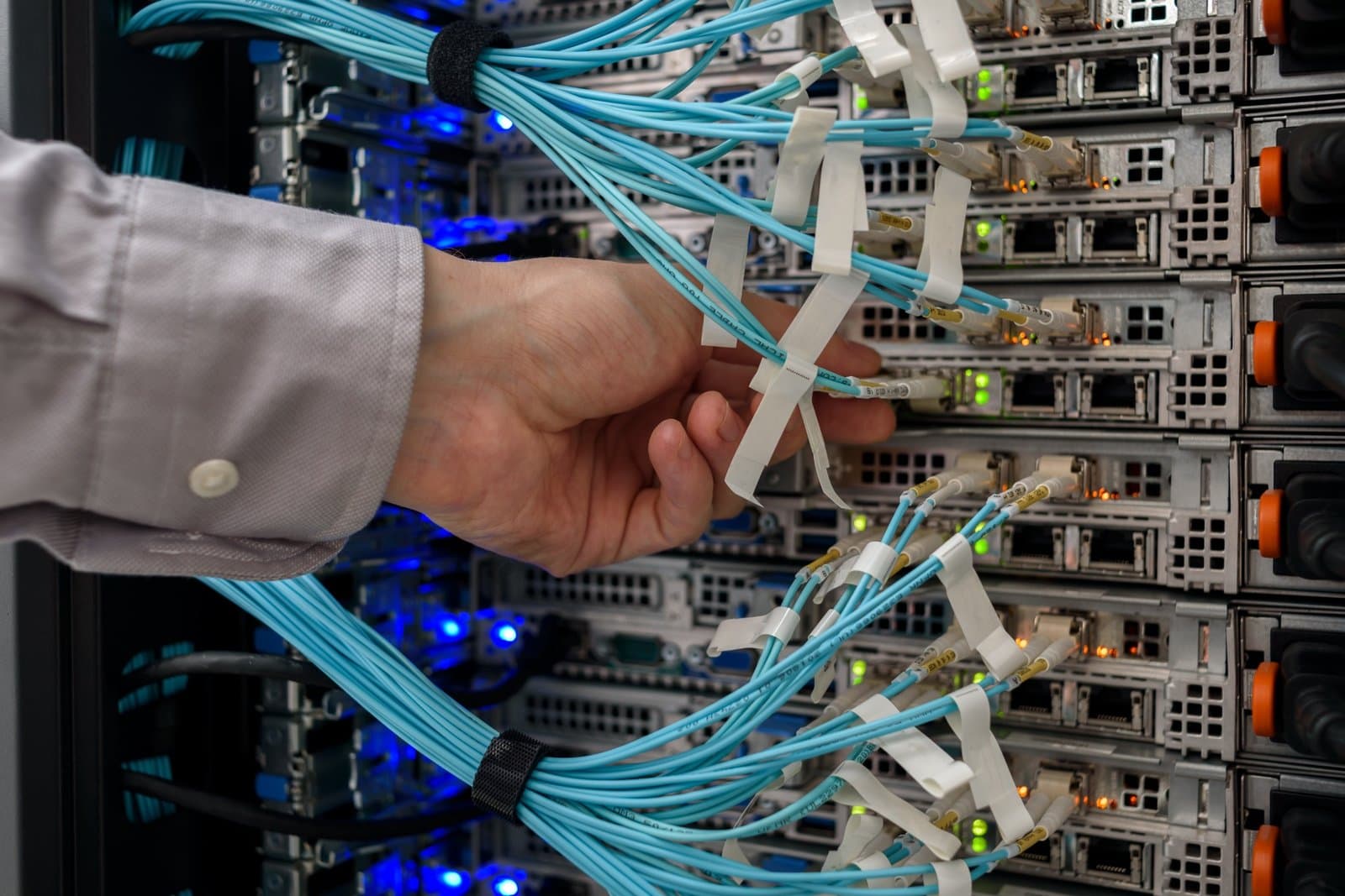 technician-adjusting-network-cables
