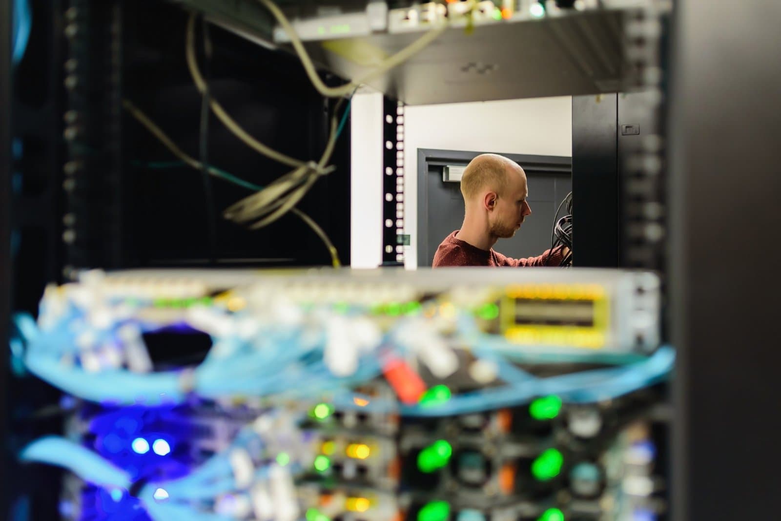 technician-maintaining-server-rack